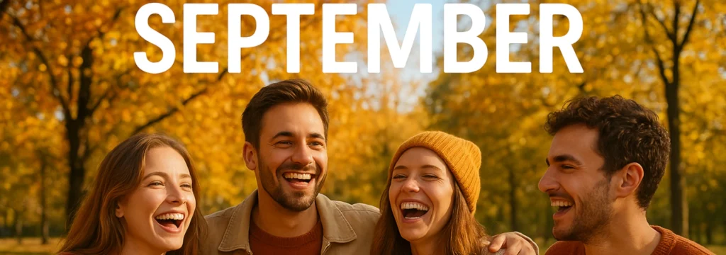 Vier lachende Personen, die im September in einem herbstlichen Umfeld stehen.